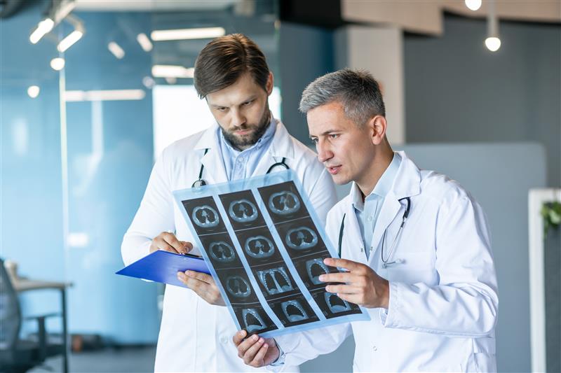 Modern radiology department with MRI scanner and medical professionals